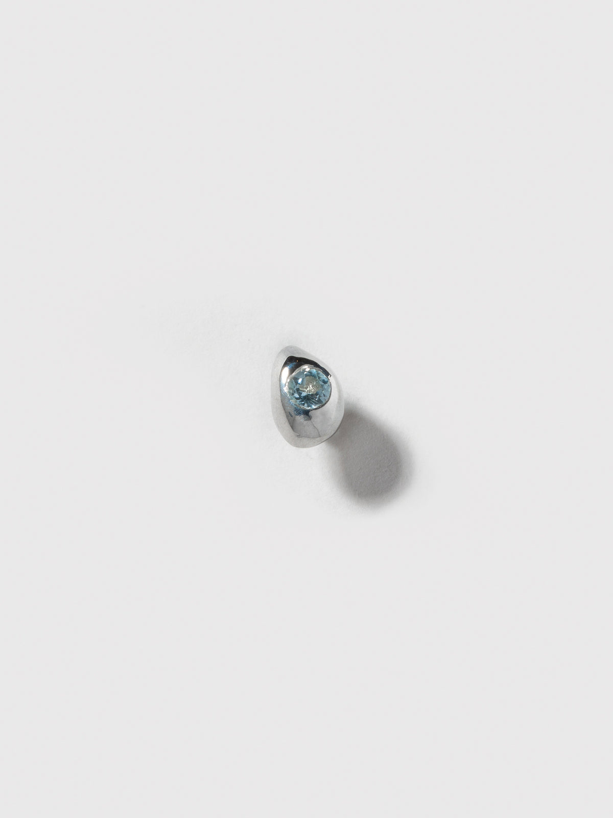 Product image of FARIS EGG GEM Stud in sterling silver with topaz (front view)