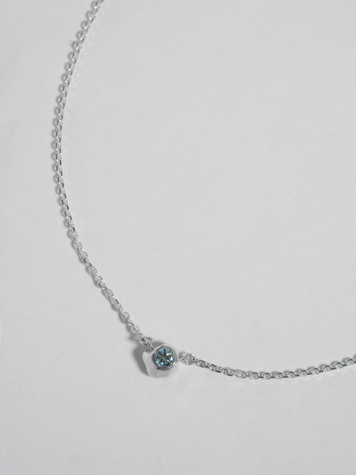 Close up product image of FARIS KIRA Necklace pendant in sterling silver with topaz
