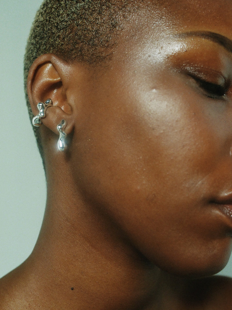 FARIS SEEP Hoop Small in Sterling Silver shown on model. Styled with SEEP Ear Cuff in Sterling Silver