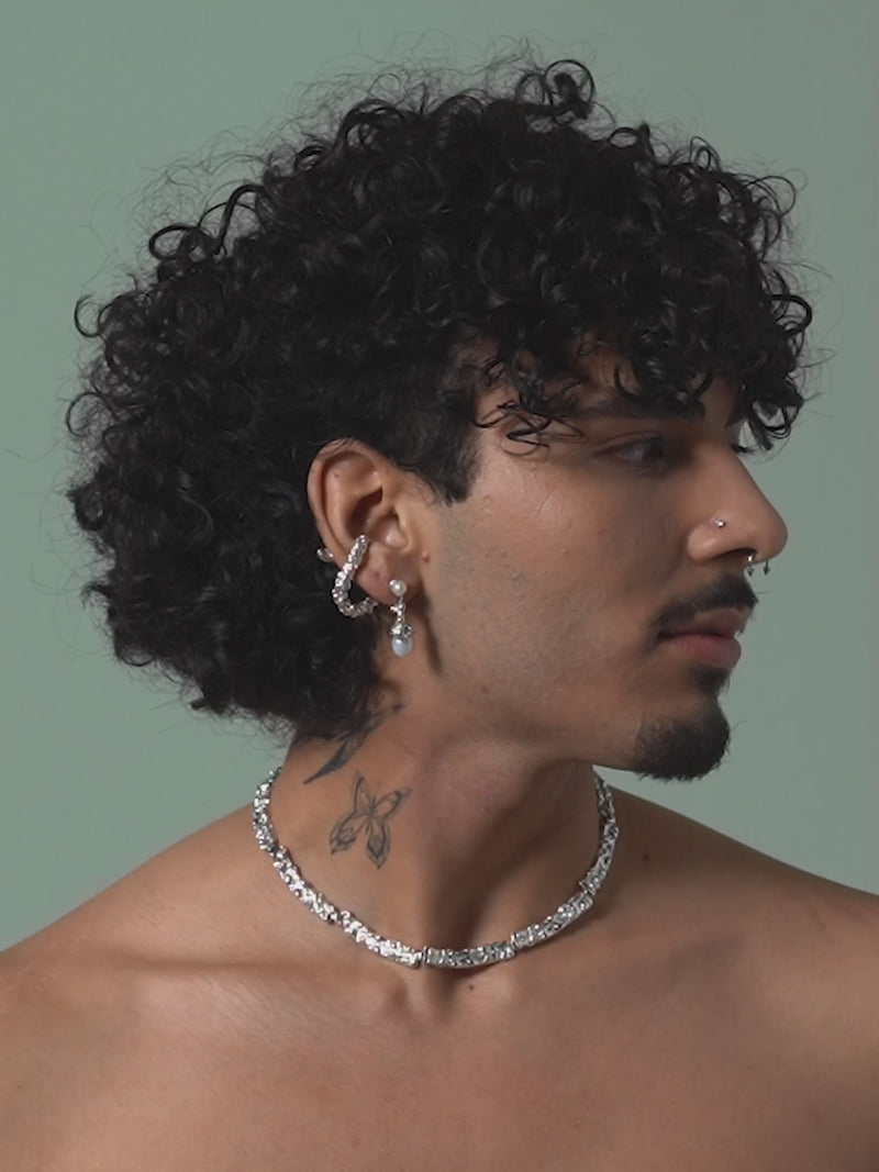Short clip of male model wearing FARIS ROCA Hang in sterling silver. Styled with SOPHIA Drops in sterling silver and BRUTO Collar (15") in sterling silver