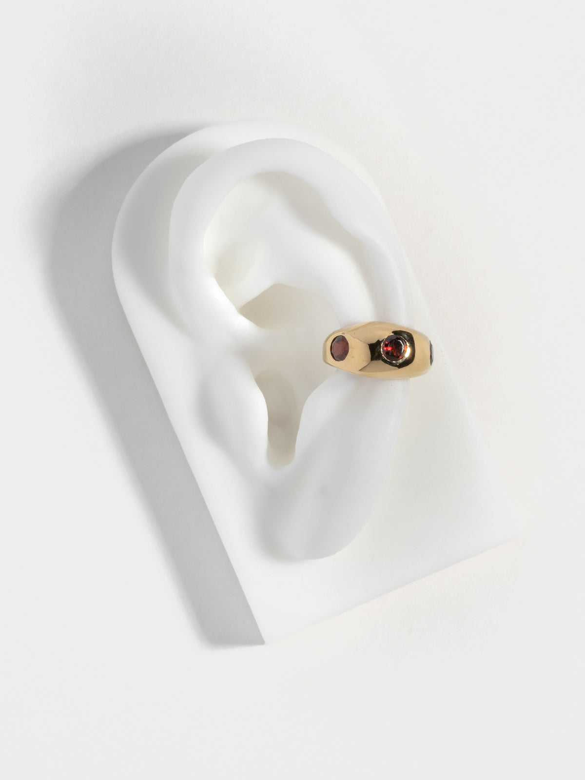 Gold plated GROSSO Gem ear cuff with garnet gems 