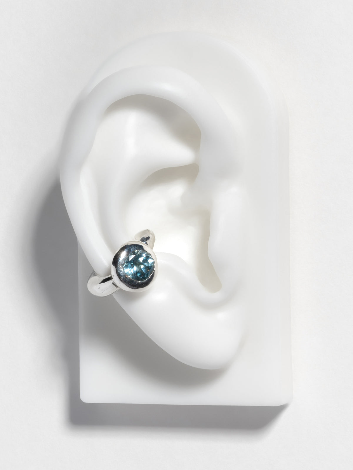 Sterling silver OH Ear cuff with 7mm diamond cut topaz