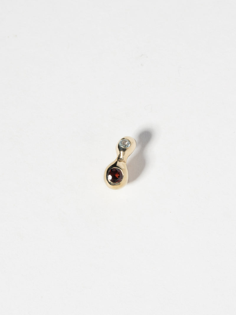 Product image of FARIS CHAMELLE GEM Stud in 14k Gold Plate with 3mm round topaz and 4mm round garnet (front view)