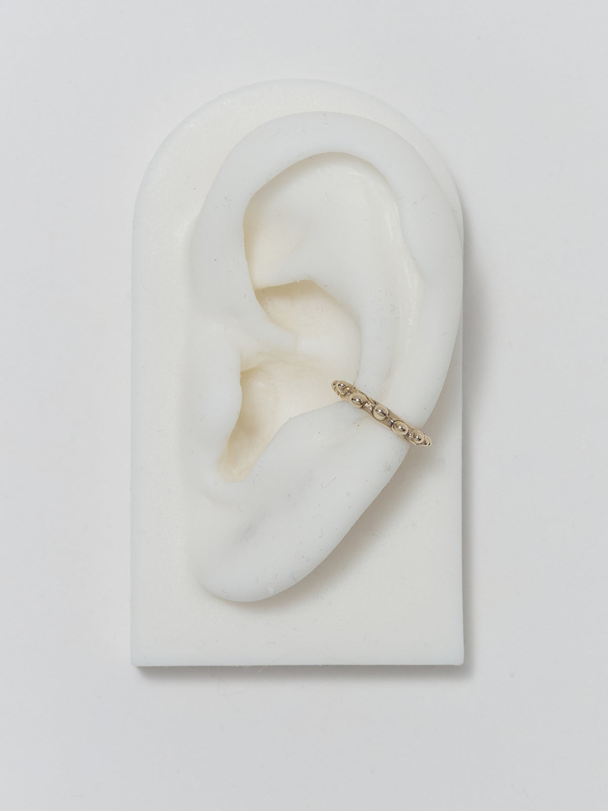 DOTTO EAR CUFF MINI IN GOLD PLATED BRONZE