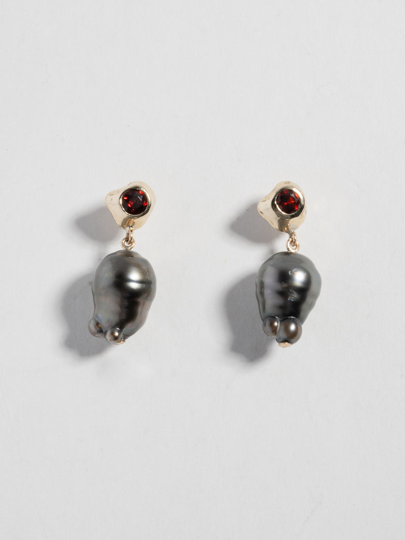 Product image of FARIS KIRA PERLA Earrings in 14k gold with garnet and black Tahitian pearls (positioned side by side, front view)