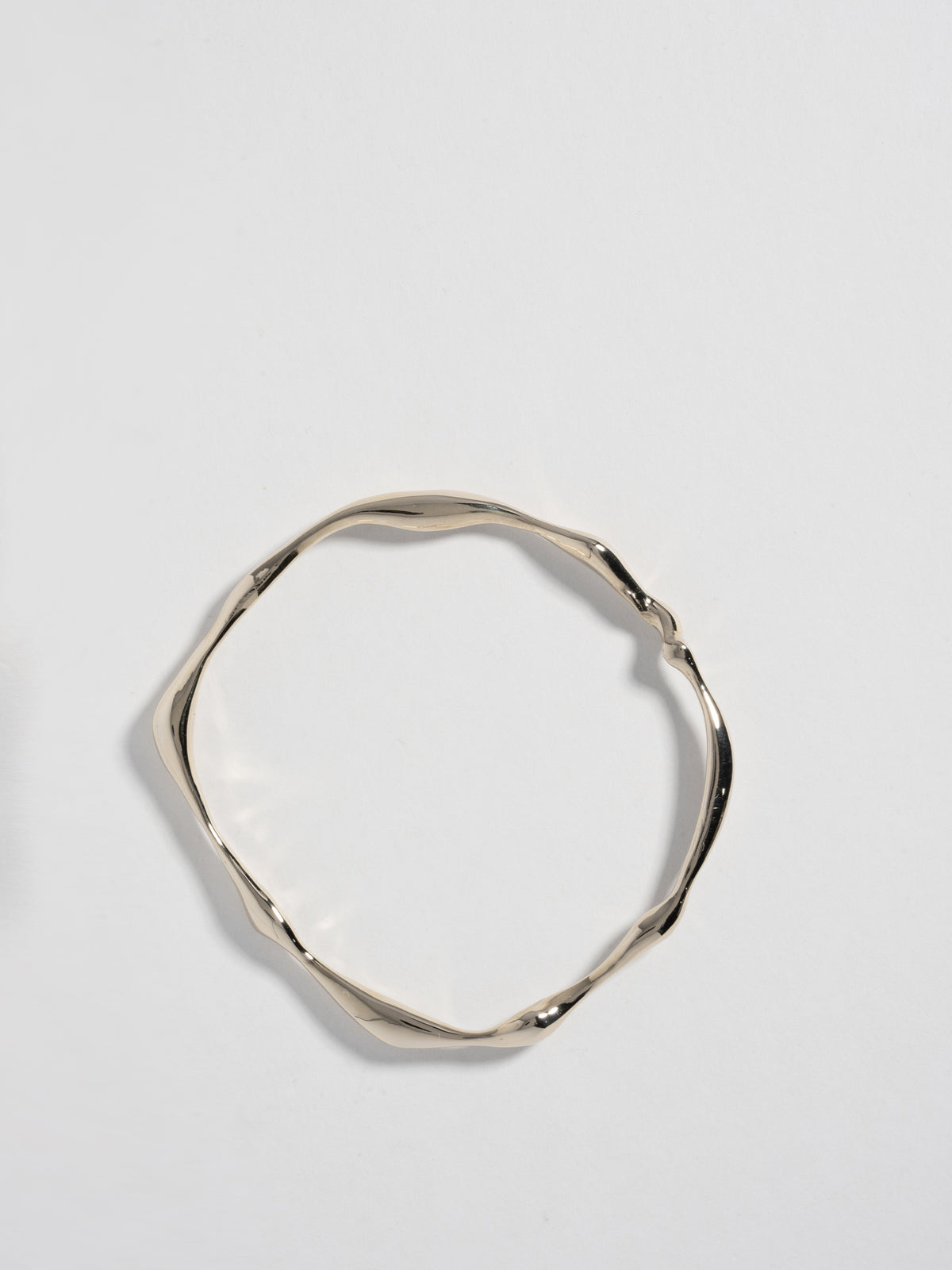 Front view product image of FARIS ONDA Bangle in gold-plated bronze