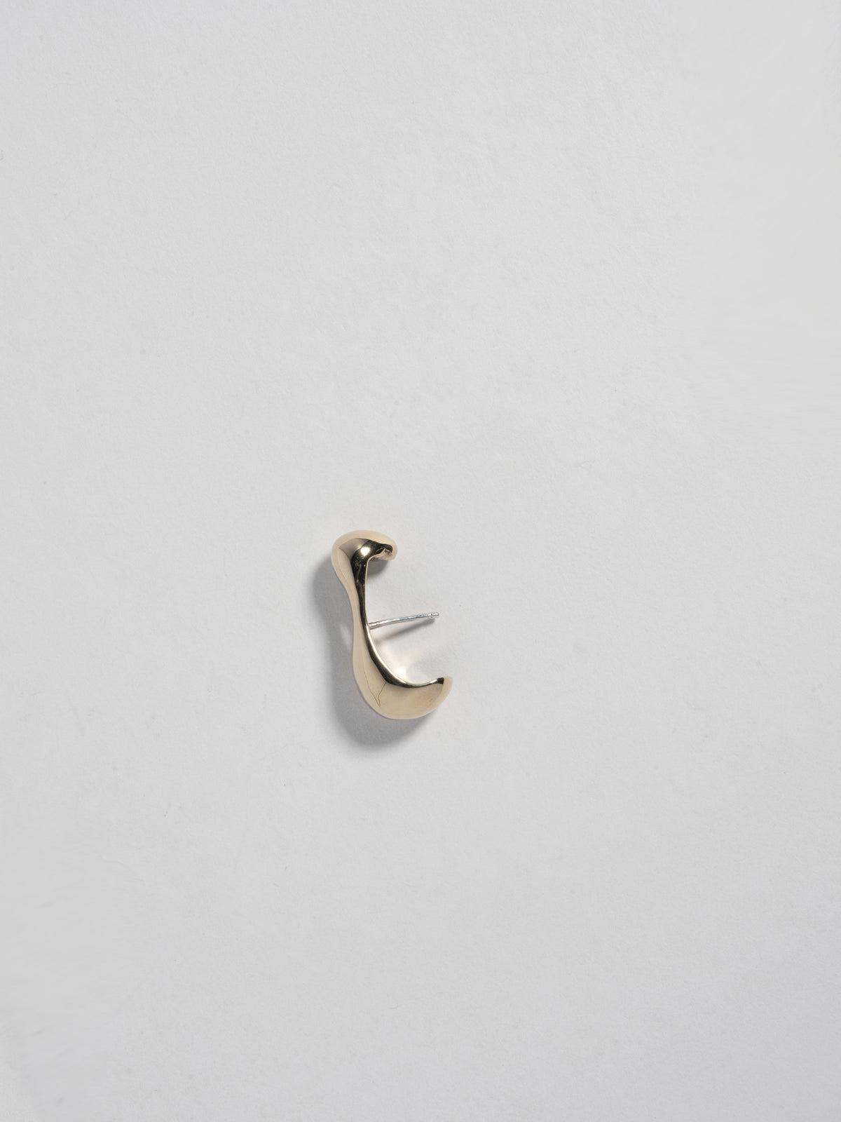Close up product image of FARIS REST Stud in gold-plated bronze (side view)