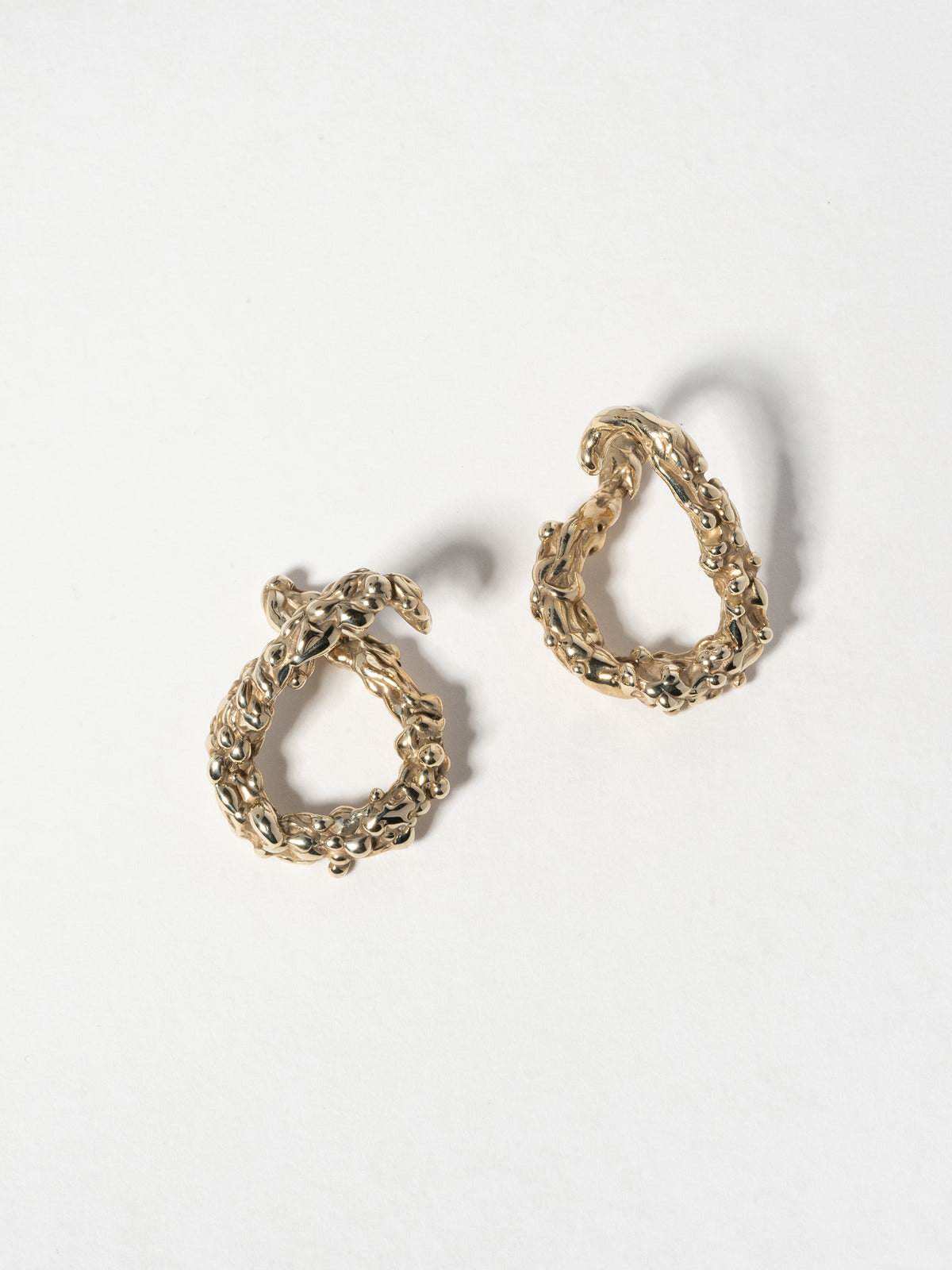 Product image of both left and right ear orientations of FARIS ROCA Hang in 14k gold plate.