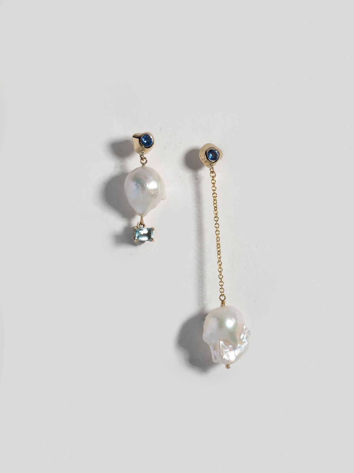 Product image of FARIS VENUS Drops in gold-plated bronze with lab-created blue sapphire, baroque pearls, and natural topaz