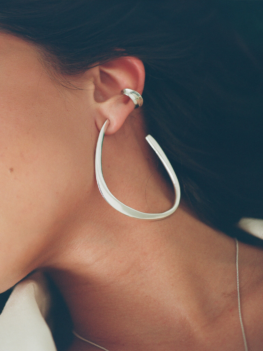 FARIS AERO Hoops Large and ear cuff on model in silver