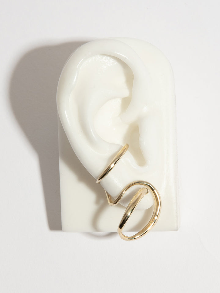 CURSIVE EARPIECE