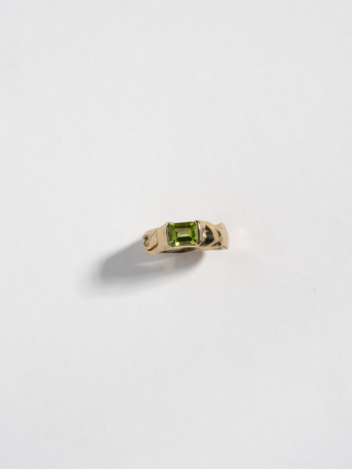 14k gold plated NAST ring with peridot (top view)