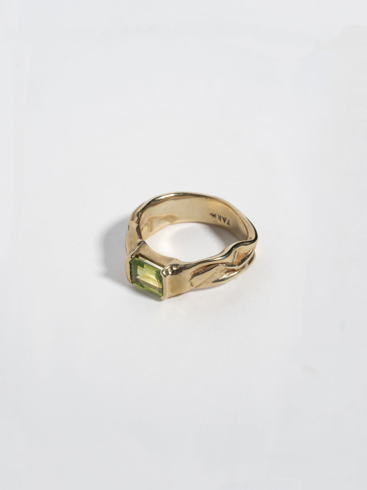 14k gold plate NAST ring with peridot (side view)